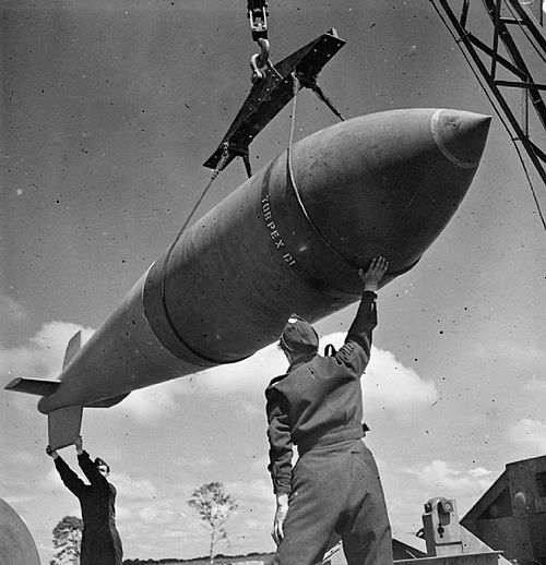 RAF ground crew handling the Tallboy that was later dropped on the La Coupole V-weapon site at Wizernes, France in 1944