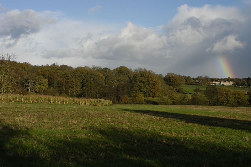 File:Sandleford Priory, and rainbow, and part of High Wood, from the old carriage track to the west, near Gorse Covert, 2015.jpg