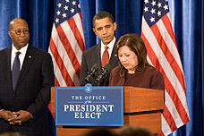 Solis speaks at the announcement of her being chosen as the new Secretary of Labor; President-elect Barack Obama looks on, as does U.S. Trade Representative nominee Ron Kirk. SolisObamaSecLaborAnnouncement.jpg