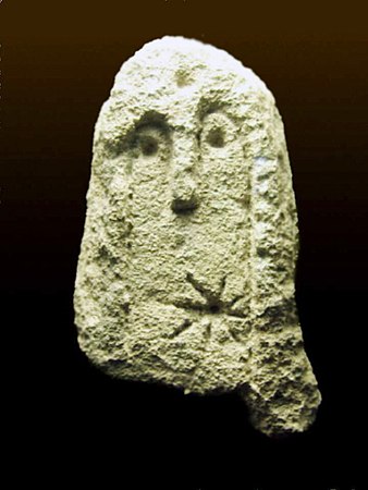A solar representation on an anthropomorphic stele from Rocher des Doms, France, Chasséen culture, 5th-4th millennia BC.