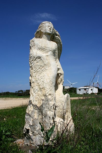 File:Statue in wind farm.jpg