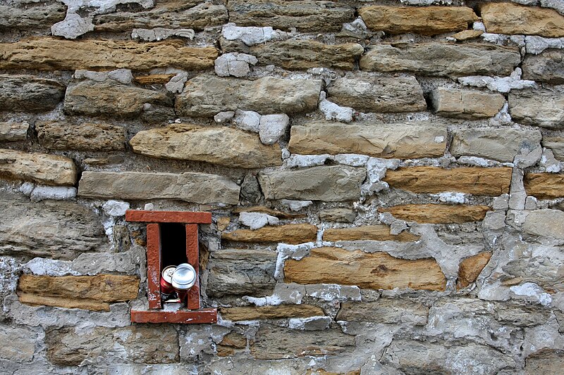 File:Stone Wall & Beer Can.jpg