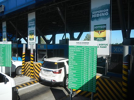 A car stopping at a tollbooth in Subic–Clark–Tarlac Expressway.
