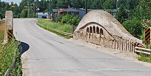 Looking down the length of the Ten Curves Road-Manistique River Bridge Ten Curves Road-Manistique River Bridge A.jpg