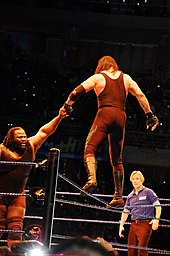 Henry lost to The Undertaker at WrestleMania 22 and Unforgiven 2007 The Undertaker applique son Old School.jpg