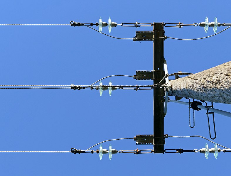 File:Top of power line pole - west side.jpg