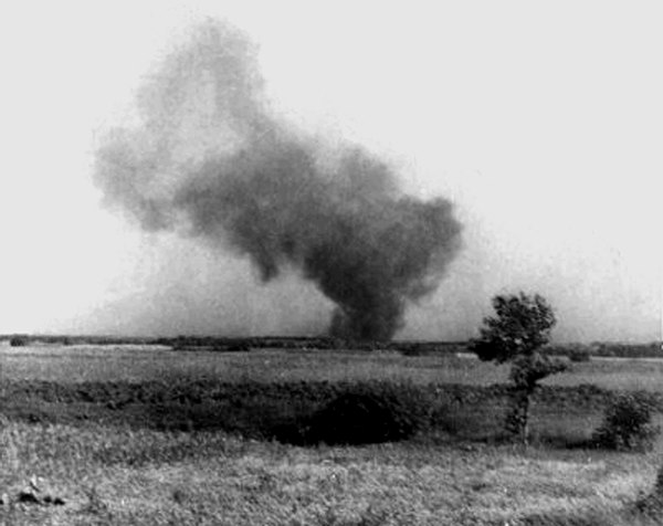 Smoke rising from Treblinka extermination camp during the prisoner uprising of August 1943