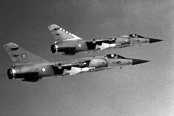 A pair of French Air Force Mirage F1Cs from the EC 2/30 and EC 3/30 in flight, 31 May 1986.