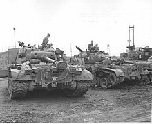 Pershing and Sherman tanks of the 73rd Heavy Tank Battalion at the Pusan Docks, Korea. US-tanks-korea.jpg