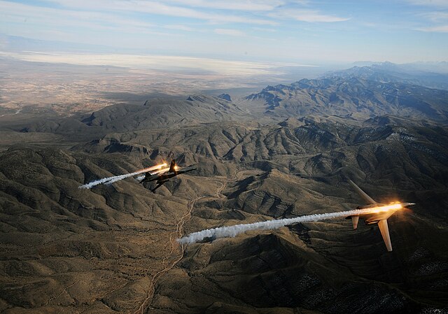 28th Bomb Squadron B-1B Lancers release chaff and flares while maneuvering during a training mission 24 February 2010