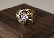 A USMA class ring, class of 2012, "For More Than Ourselves". USMA Class Ring, Class of 2012, "Never Forget".jpg