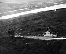 Harder rescuing a pilot from USS Bunker Hill at Woleai, 1944. USS Harder (SS-257) rescueing pilot at Woleai 1944.jpg