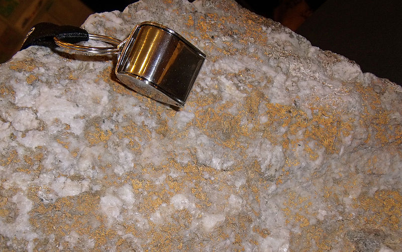  Quartz fracture laced with spectacular visible gold. Boulder is 1 foot long from an outcropping vein found by Yukon prospector Alex Macmillan of Watson Lake. Property is available for option under the name of Hyland Gold. This find could become incentive for a staking rush in a whole new area in the southern Yukon. Specimen displayed in Yukon Room at the 2010 Vancouver Roundup. Location The Hyland property is situated in the Watson Lake Mining District of South Eastern Yukon Territory, Canada. It is located 70 kilometres northeast of the village of Watson Lake and is centered at latitude 60º 30' N and longitude 127º 50' W. The property is accessible by helicopter, float plane and 4x4 roads.