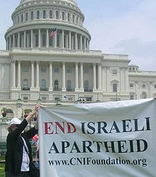 Council for the National Interest at June 2007 rally referencing the Israel and apartheid analogy. 06-10-07-CNIatCongress.JPG