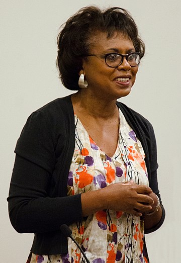 Hill in 2014 speaking at Harvard Law School