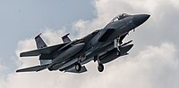 A US Air Force F-15C Eagle, tail number 82-0038, on final approach at Kadena Air Base in Okinawa, Japan.