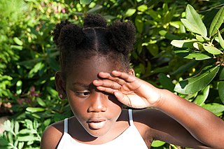 <span class="mw-page-title-main">Afro puffs</span> Hairstyle