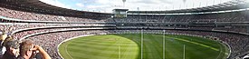 The King's Birthday match (pictured in 2011) is an Australian rules football game held annually on the King's Birthday holiday in Victoria. Aussi Rule Football - Queen's Birthday Holiday clash.jpg