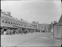 The interior of Birmingham Market Hall in 1942, after it was gutted and its roof destroyed by German bombs. Birmingham in Wartime, England, 1942 D9422.jpg