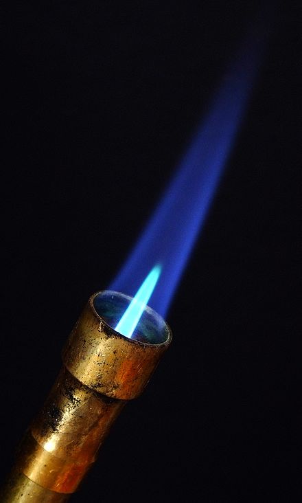 Flame from fuel premixed with air
