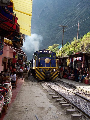 A train in a crowded area of Bolivia