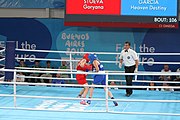 Deutsch: Boxen bei den Olympischen Jugendspielen 2018 Tag 12, 18. Oktober 2018 - Kampf um die Bronzemedaille im Fliegengewicht Mädchen – Heaven Destiny Garcia (USA, blau) schlägt Goryanana Stoeva (Bulgarien, rot) 5-0; Ringrichter ist Ishanguly Meretnyyazov (Turkmenistan). English: Boxing at the 2018 Summer Youth Olympics on 18 October 2018 – Girl's flyweight Bronze Medal Bout - Heaven Destiny Garcia (USA, blue) beats Goryanana Stoeva (Bulgaria, red) 5-0; Referee is Ishanguly Meretnyyazov (Turkmenistan). Español: Boxeo en los Juegos Olímpicos Juveniles de Verano de 2018 en 18 de octubre de 2018 - Combate a medalla de bronce de peso mosca para mujeres: Heaven Destiny Garcia (Estados Unidos, azul) le gana a Goryanana Stoeva (Bulgaria, roja) 5-0; El árbitro es Ishanguly Meretnyyazov (Turkmenistán).