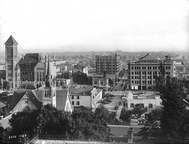 c.1893–1900, looking east along Third St. from Olive St. on Bunker Hill. 3 buildings stand out from left to right: the 1888 City Hall (Broadway betwee