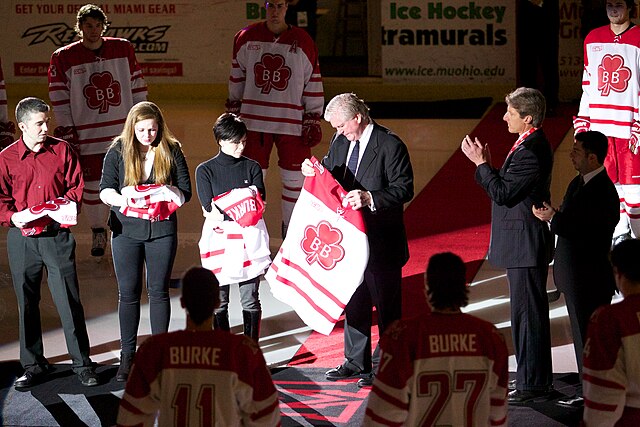 On February 5, 2011, the one-year anniversary of Burke's death, Brian Burke and his family are presented with special hockey sweaters in commemoration