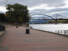 View of the Cass St. and Cameron Ave. Bridges, which both cross the Mississippi River, from Riverside Park in Downtown La Crosse