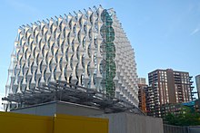 View of the US Embassy building from Ponton Road with the Embassy Gardens Sky Pool in the background Cmglee London US Embassy Sky Pool.jpg