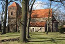 Village church with cemetery wall