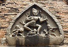 Durga, the slayer of the buffalo-demon, is represented on the pediment above the entrance to the temple. Durga ornament Po Nagar.jpg