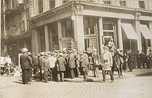 German Americans outside the Staats-Zeitung offices, reading about the outbreak of World War I (1914) Enemy Activities - Miscellaneous - German-Americans grouped around the bulletin board of the Staats-zeitung, New York at the outbreak of the war. 1914 - NARA - 31480226 (cropped).jpg