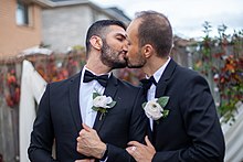 A same-sex couple kissing on their wedding day in Toronto, 2020 Gay Wedding in Toronto by Pouria Afkhami Canada 08.jpg