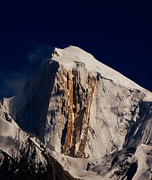 The shining cristalized marble Golden Pillar of Spantik (centre) Golden Peak - Pakistan (cropped).jpg