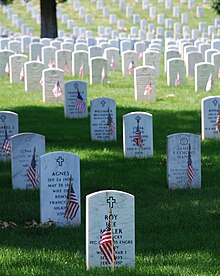 Gravestones at the cemetery are marked by U.S. flags each Memorial Day Graves at Arlington on Memorial Day.JPG
