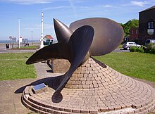 Propeller from HMS Cavalier erected in 1995 as a memorial on the esplanade at East Cowes, Isle of Wight, "in recognition of the shipbuilders of J. Samuel White and the sailors who gave their lives for their country". HMS Cavalier propeller.jpg