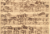 Ex. 4 Bach MS: the keyboard part is thought to be an extremely rare transcription of a live Bach realization J.S. Bach BWV 1030 holograph.png