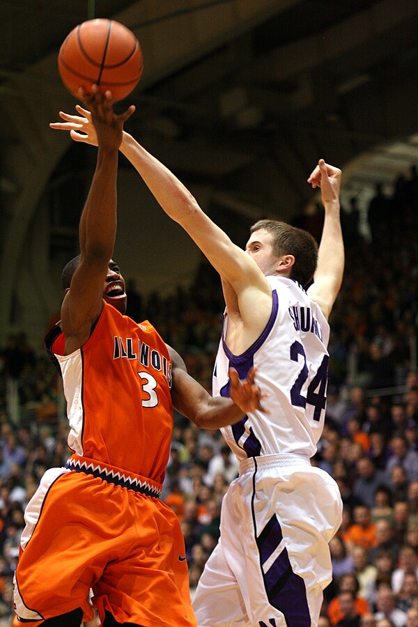 Paul drives against John Shurna in 2010