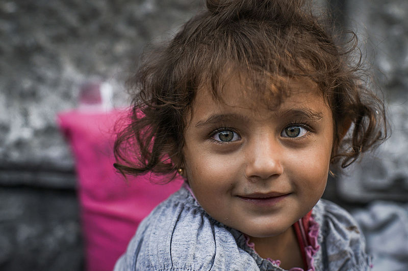 File:Little Syrian girl portrait captured during refugees strike in front of Budapest Keleti railway station. Refugee crisis. Budapest, Hungary, Central Europe, 3 September 2015.jpg