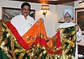 The Former Prime Minister Manmohan Singh Handing over the 'Chadar' to Minister of State Prithviraj Chavan for Dargah since 2009