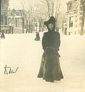 Marjory Clouston on Sherbrooke Street with Drummond Street leading up to Mount Royal behind her, 1902 Marjory Meredith Clouston at the corner of Drummond and Sherbrooke, Montreal, 1902.jpg
