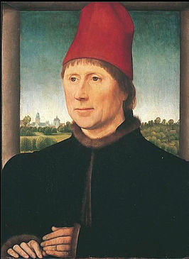 Portret van een man met een rode muts