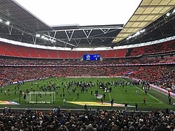 The first pitch invasion at the new Wembley Stadium by Millwall fans, May 2017 Millwall pitch invasion at Wembley, May 2017.jpg