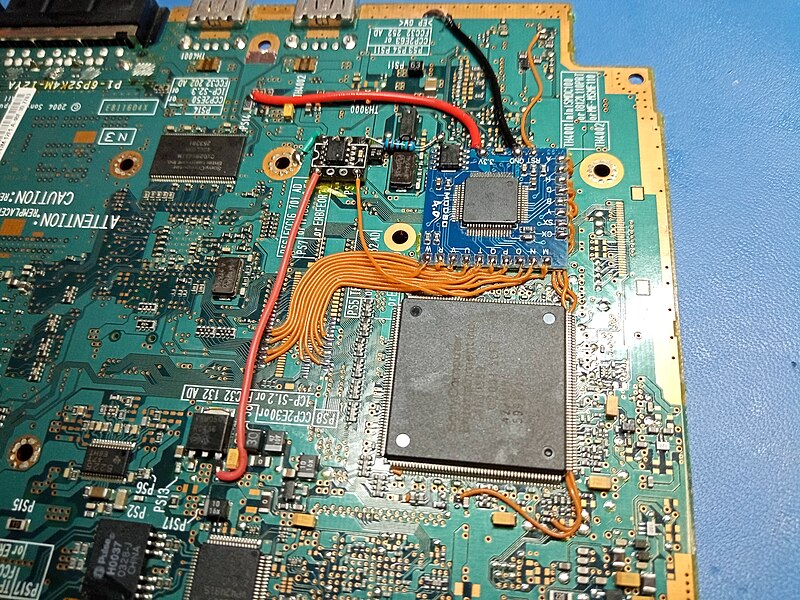 File:Modbo4 installation on PS2 Slim v12 motherboard.jpg