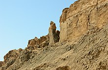 Mount Sodom, Israel, showing a pillar referred to as "Lot's Wife", made of halite. MountSodom061607.jpg