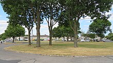 Open recreation area amid housing on Muckross Grove, Perrystown.