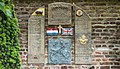 Oorlogsmonument in muur van Sint Nicolaaskerk in Broekhuizen (Horst aan de Maas) in provincie Limburg in Nederland.