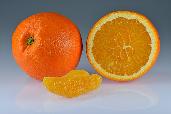 Orange—whole, halved, and peeled segment