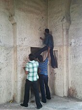 People defacing the walls of the Golconda Fort in Hyderabad, India People defacing the Golconda walls.jpg